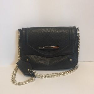 Small Black Handbag with Gold Metal Touches